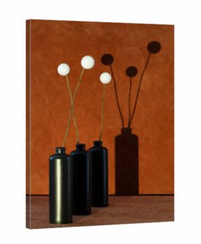 White balls in bottles on twigs with a shadow on a brown background