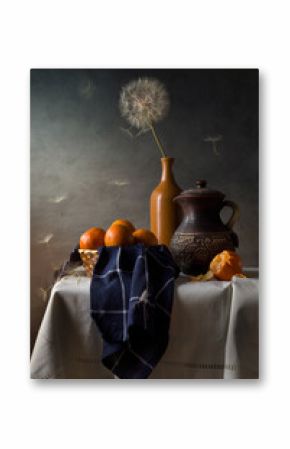 Modern still life with dandelions and tangerines on a dark background