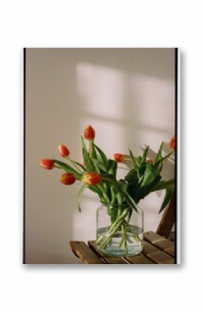 Red tulips in a jar on 35 mm film