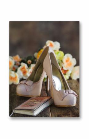 Fashion high heel shoes, flowers and day planner. Business woman concept