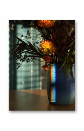 Stunning Floral Arrangement with Rainbow Reflection