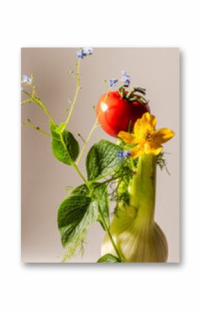A fennel with tomato, and a marsh marigold and forget me nots.