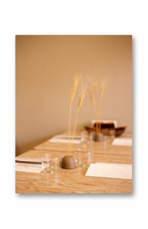 Minimalist table with decorative wheat