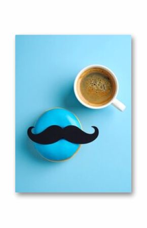 Blue donut with mustache, coffee cup on blue background