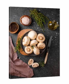  Fresh raw champignon mushrooms on gray background top view