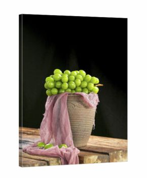 Fresh Green Grapes in Rustic Basket with Rose Fabric on Wooden Table - Healthy Fruit Still Life