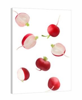 scattered radishes and slices on a black backdrop