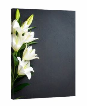 White lilies on dark textured surface