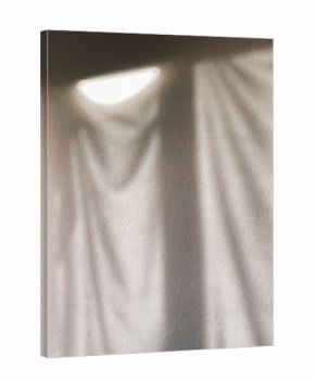 Shadow of a curtain on the wall