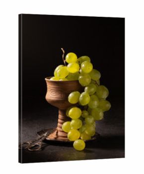 Still life with vintage items, fresh ripe grape