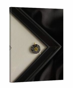 pendant with a fern on a candle