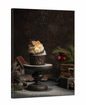 Chocolate cupcake with cream and fruits
