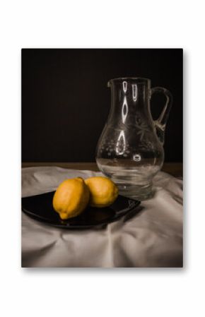 still life with lemons on a white cloth