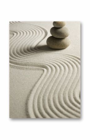Stack of stones on raked sand