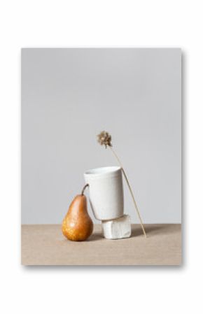 Still life with a cup and a pear