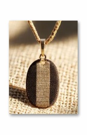 Gold Oval Pendant Necklace on Burlap Fabric