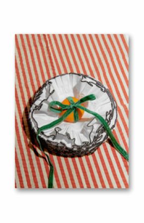 Orange Wrapped in White Fabric