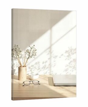 Minimalist desk setup with a wooden pencil holder, eyeglasses, and a closed laptop, bathed in soft sunlight and plant shadows.