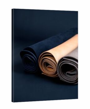 rolled leather sheets in rich tones