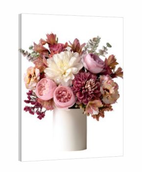 A bouquet of soft pink, blush, and cream flowers in a white vase