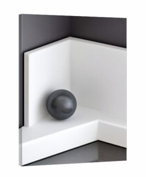 A dark gray ball rests in the corner of a white structure, with a dark gray background and reflective surface.