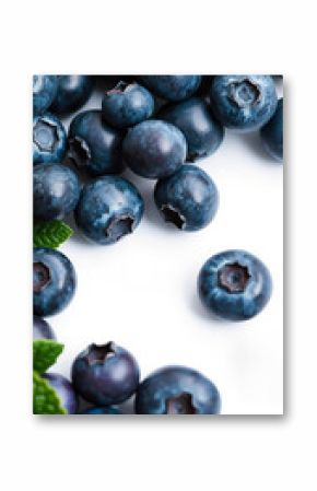 close-up of fresh blueberries with mint leaves on white background