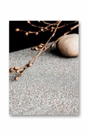 Branches and stone on surface