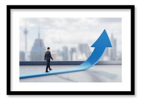 Young businessman walking on abstract upward blue arrow on blurry city background. Growth, career and growing finance concept.
