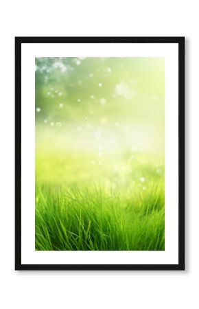 Abstract natural background with lush green young grass under bright sun with beautiful light effects and bokeh.