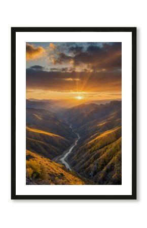 Golden sunrise over rugged mountain slopes and canyon.