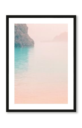 Serene Beach Landscape with Pastel Colors and Misty Atmosphere