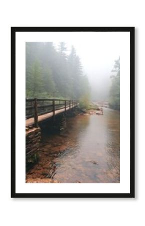 Misty Forest River with Wooden Bridge and Path