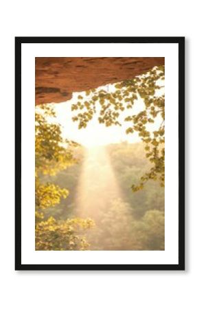 Sunlight Beam Through Sandstone Cliff with Green Vines
