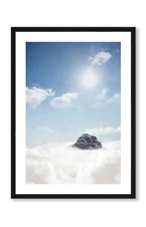 Mountain peak through the clouds