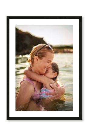 Joyful moments of family bonding at the beach during golden hour