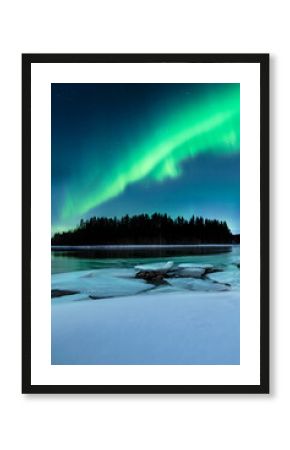 Northern lights over the Gäddviksundet in Luleå, Sweden. The water is open this winter night and on the shore lies white snow and ice floes