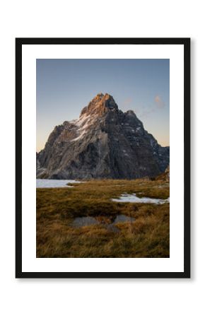 sunset at peak of Mt. Watzmann with reflection in a pond, Berchtesgaden national park, bavaria, Germany