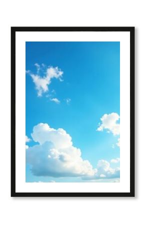 Wispy white clouds against a vibrant blue sky, idyllic summer day, fluffy, summer, blue