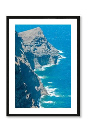 Aerial view from Mirador del Balcon, mountains and cliffs overlooking the ocean, winding roads. Gran Canaria, Spain