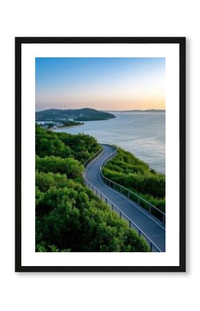 arafed view of a winding road along the coast with a view of the ocean