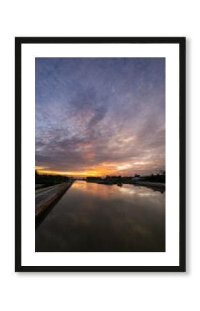 Beautiful sunset over the river in the countryside
