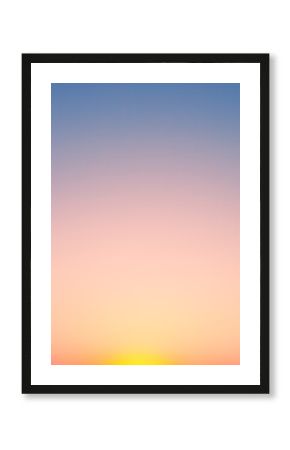 A clear, gradient sky transitions from pale blue at the top to a soft yellow-orange at the bottom, creating a serene and minimalist backdrop