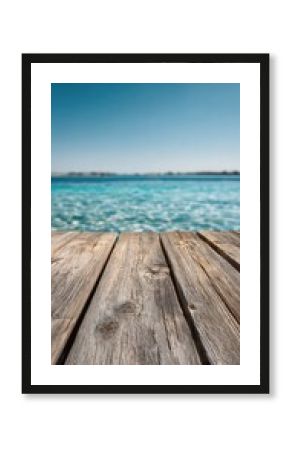 Wooden dock leading to a tranquil blue ocean