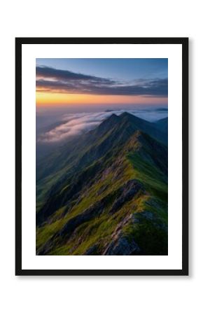 Majestic mountain range at sunset near the clouds