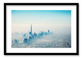 Dubai city in sunrise aerial view