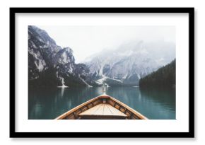 Wood boat in Braies lake