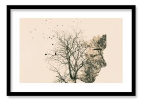 Double exposure portrait of young woman and autumn trees.