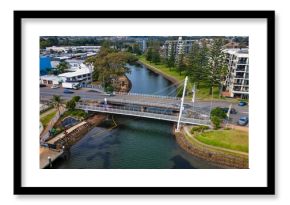 Aerial view of the bridge and streets of Port Macquarie on a sunny day in NSW, Australia