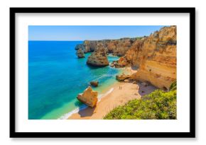 View of beautiful Marinha beach with crystal clear turquoise water near Carvoeiro town, Algarve region, Portugal