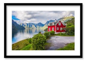 View to Sognefjord in Norway. Small town and cruise port Olden in Norwegian fjords.  Bird view of fjord in Norway.  under a sunny, blue sky, with the typical rorbu houses. View from the top